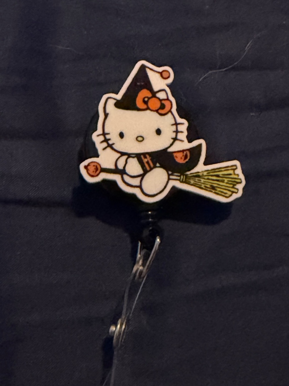 Hello Kitty Halloween Witch Badge Reel - White & Black